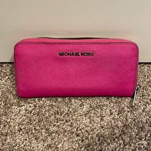 Michael Kors magenta zipper wallet
